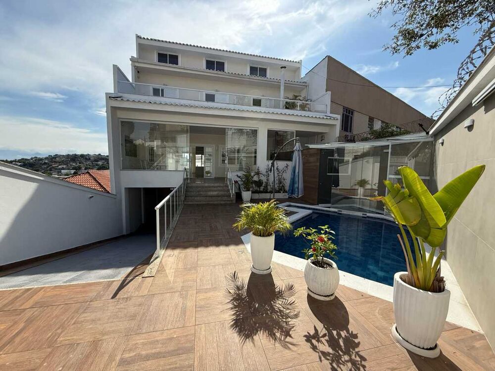 Casa à venda e aluguel com 4 quartos, 450m² - Foto 2
