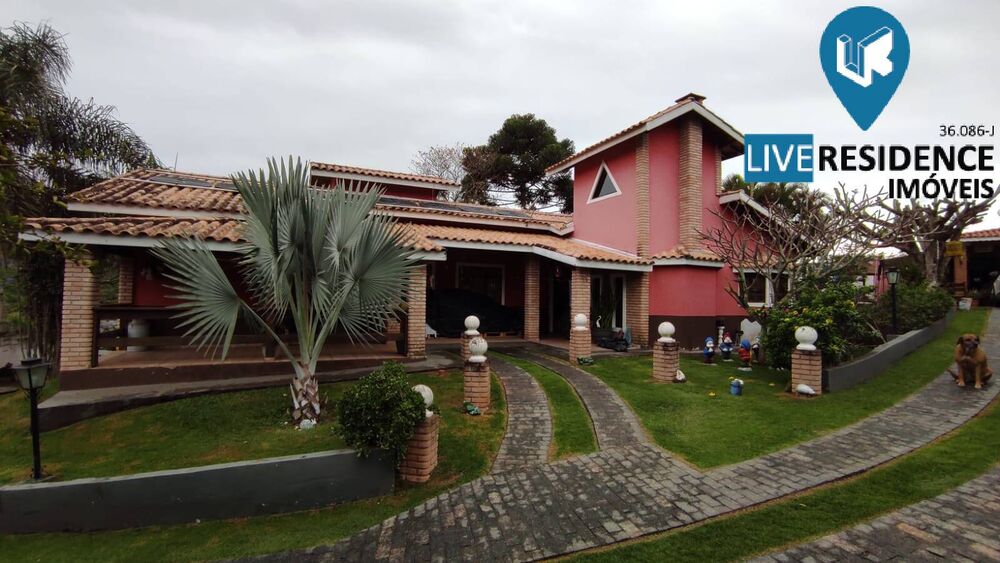 Casa à venda com 4 quartos, 313m² - Foto 1
