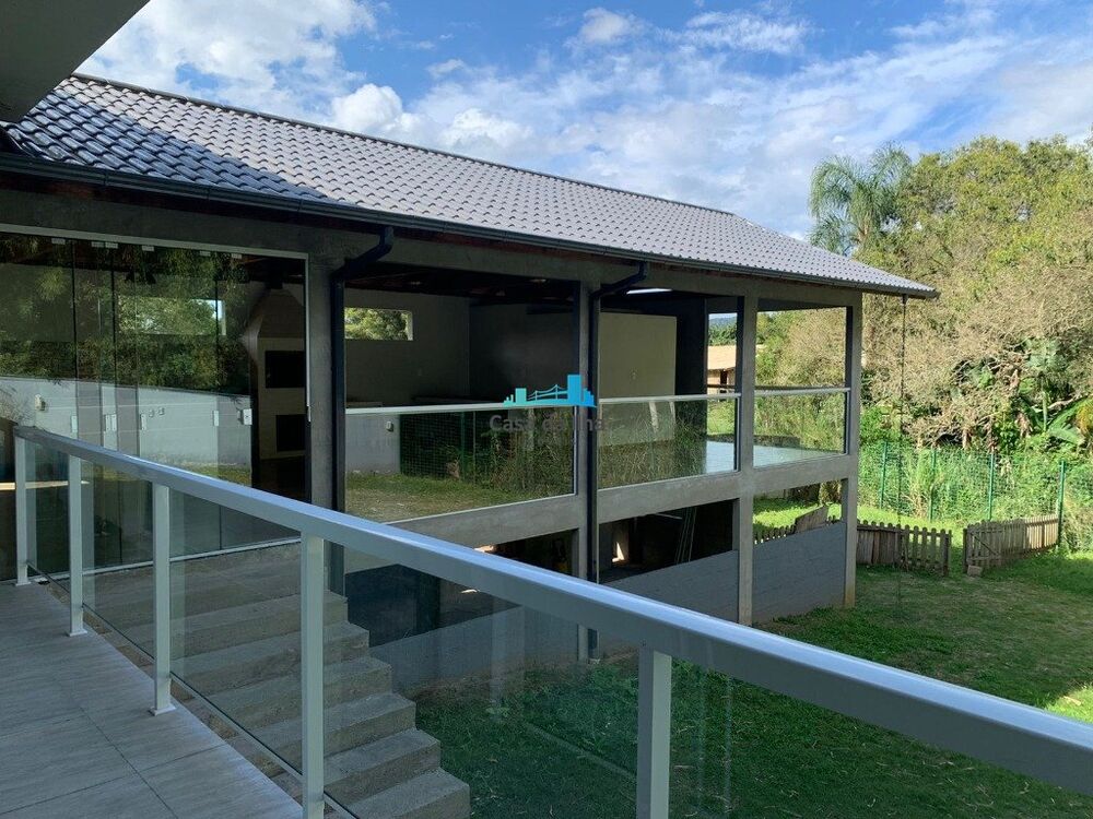 Casa à venda com 4 quartos, 327m² - Foto 1
