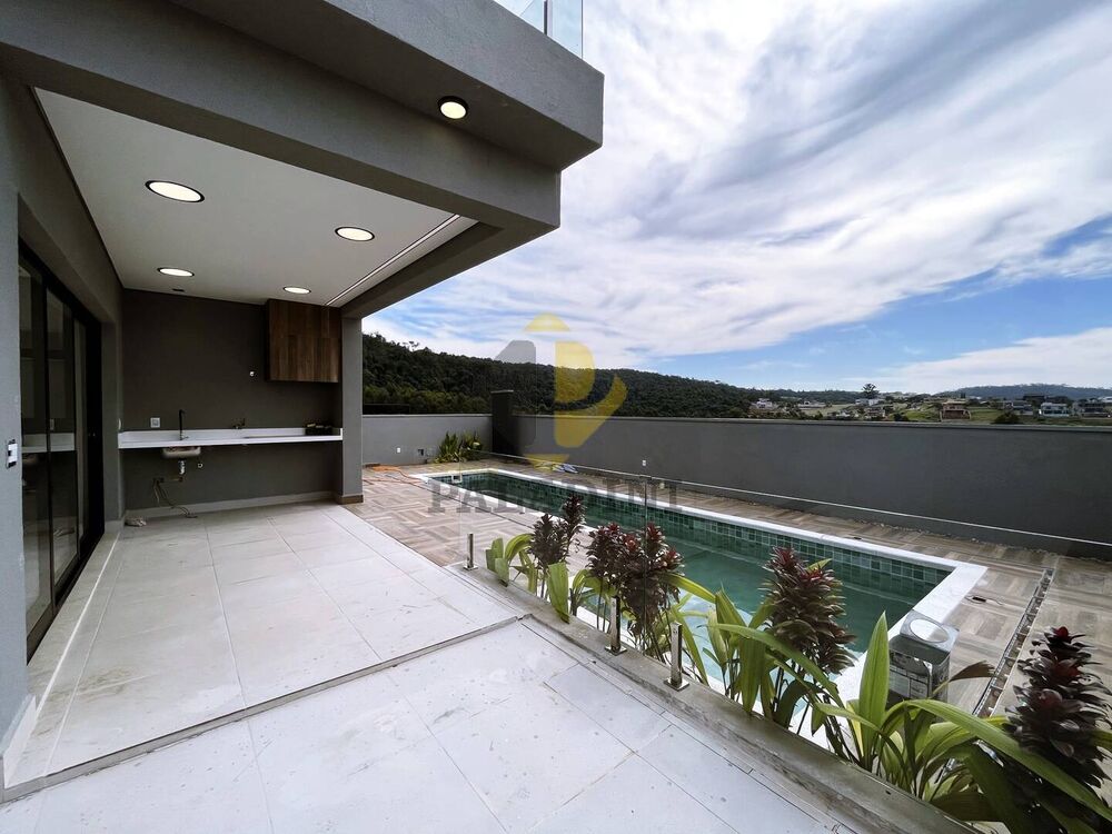 Casa de Condomínio à venda com 4 quartos, 333m² - Foto 1
