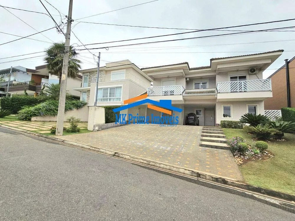 Casa de Condomínio à venda com 4 quartos, 560m² - Foto 1