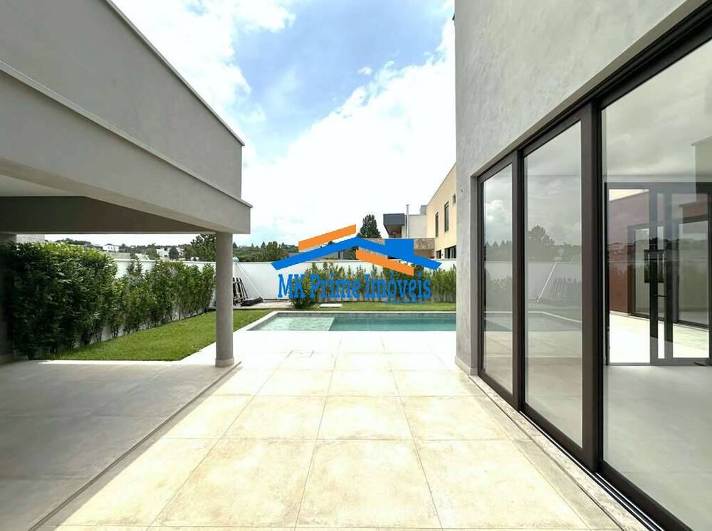 Casa de Condomínio para alugar com 4 quartos, 307m² - Foto 1