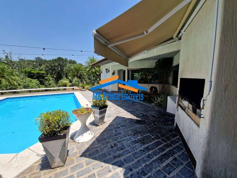 Casa de Condomínio à venda com 4 quartos, 578m² - Foto 1