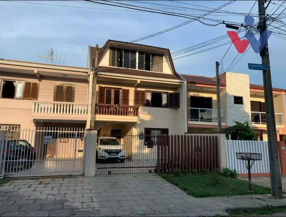 Casa à venda com 3 quartos, 130m² - Foto 1