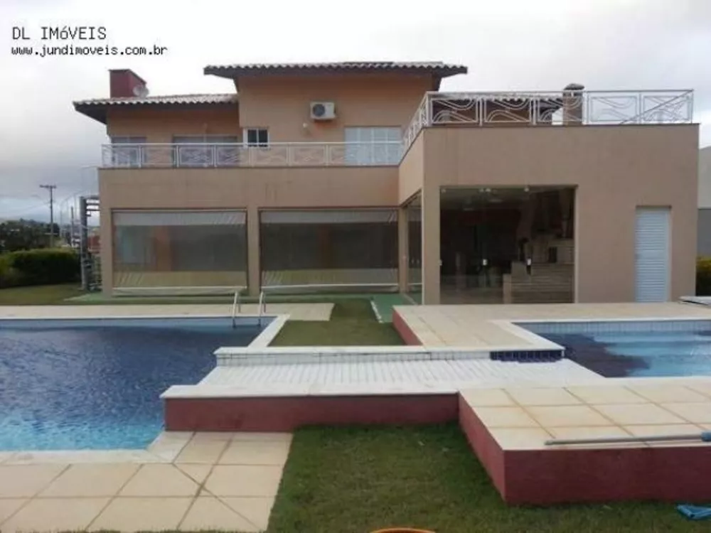 Casa de Condomínio à venda com 4 quartos, 576m² - Foto 1