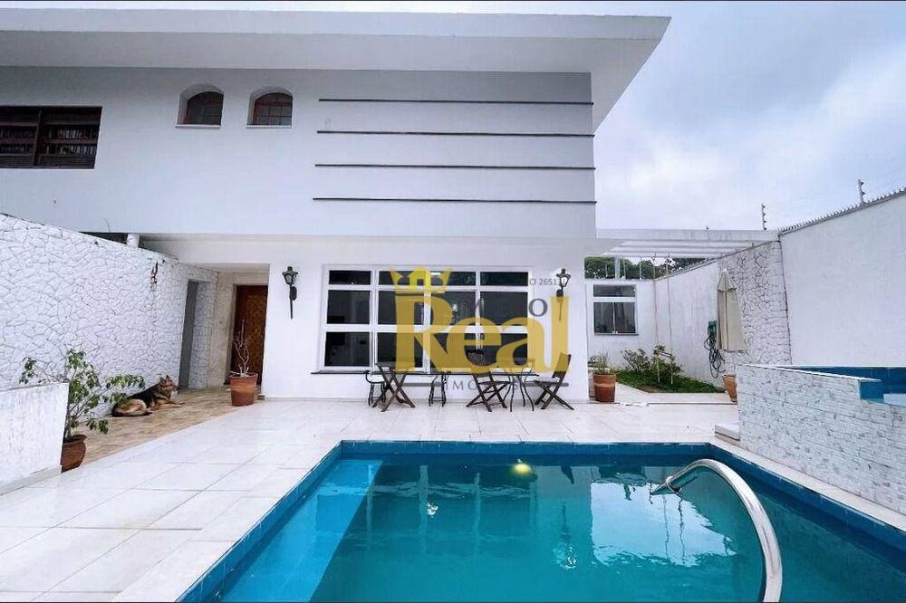 Casa à venda e aluguel com 5 quartos, 600m² - Foto 1