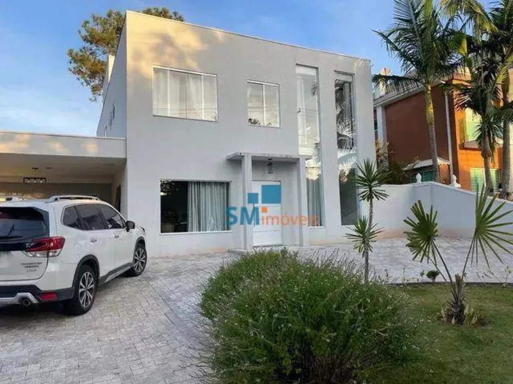 Casa à venda com 4 quartos, 312m² - Foto 1