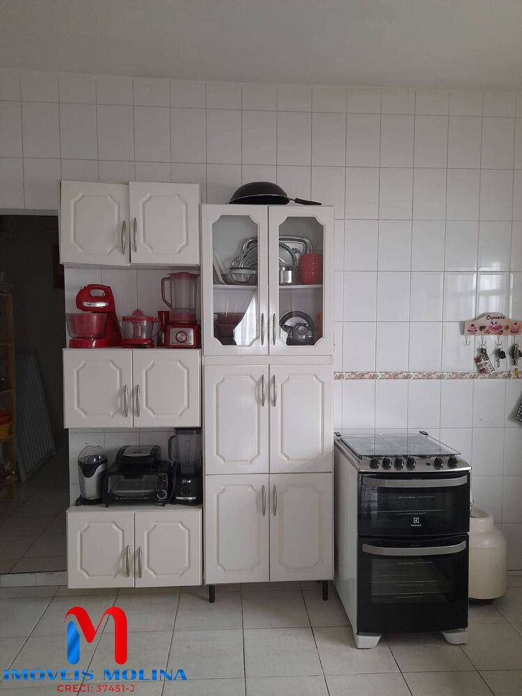 Casa à venda com 5 quartos, 150m² - Foto 11