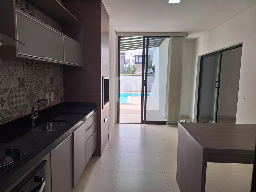 Casa de Condomínio à venda com 4 quartos, 323m² - Foto 4