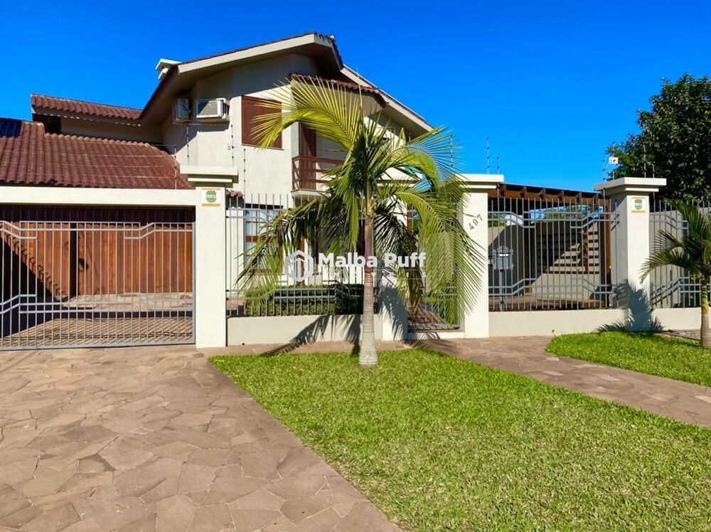 Casa à venda com 3 quartos, 298m² - Foto 1