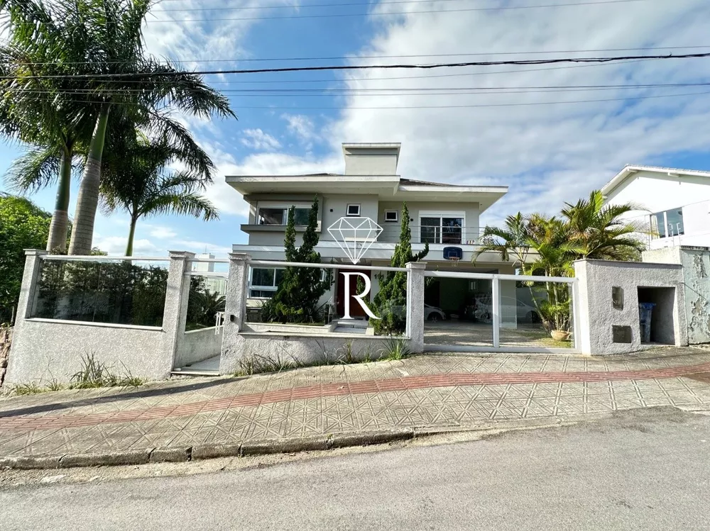 Casa à venda e aluguel com 4 quartos, 400m² - Foto 3