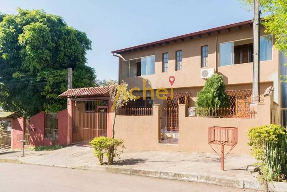 Casa à venda com 4 quartos, 270m² - Foto 1