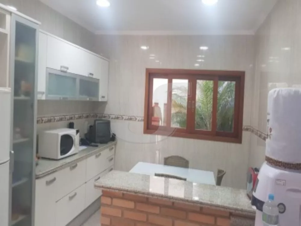 Casa à venda com 3 quartos, 315m² - Foto 4