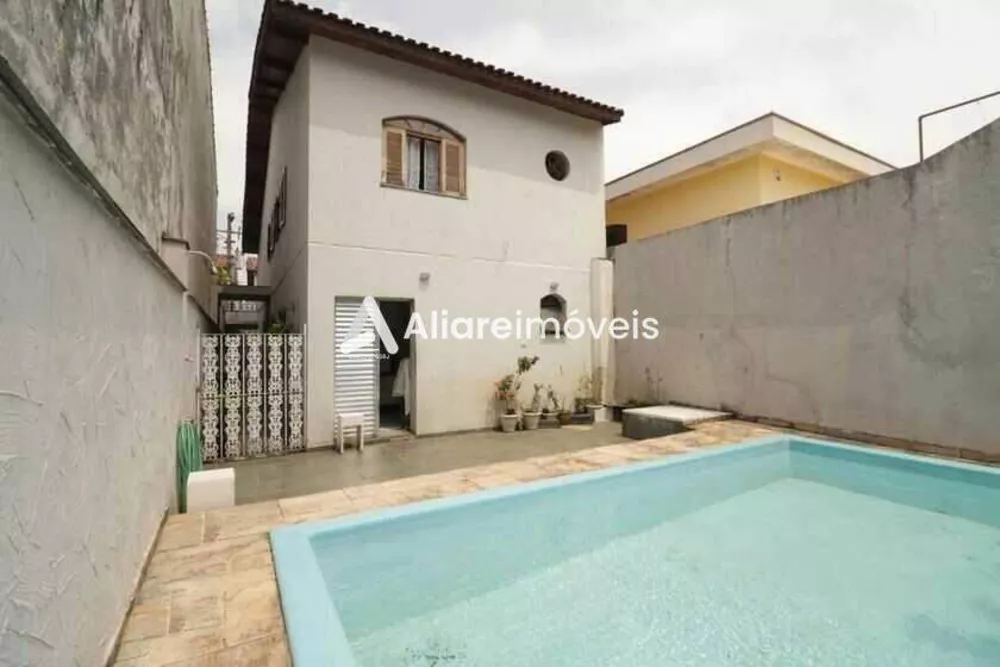 Casa à venda com 5 quartos, 186m² - Foto 1