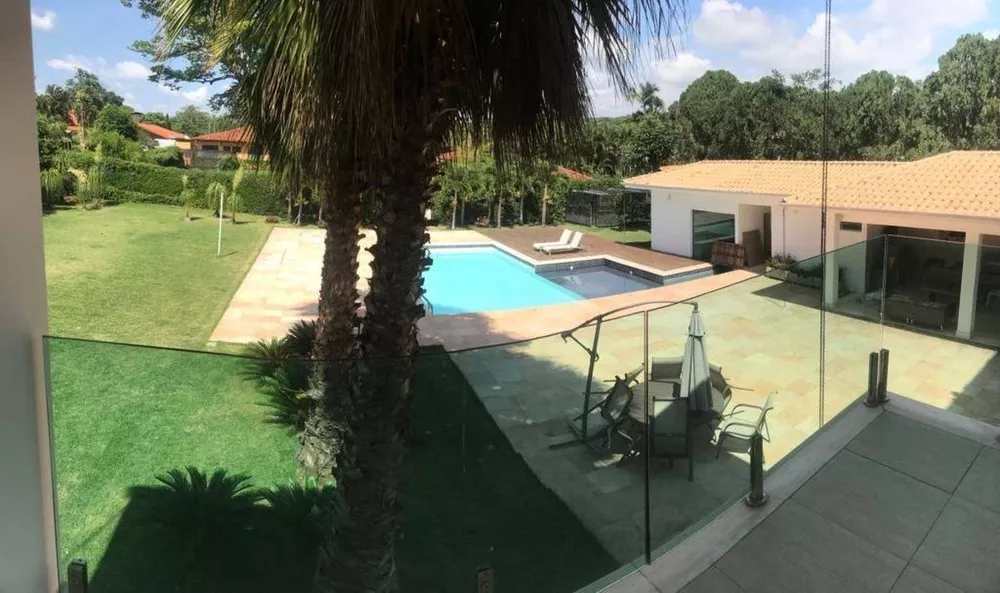 Casa de Condomínio à venda e aluguel com 4 quartos, 600m² - Foto 2