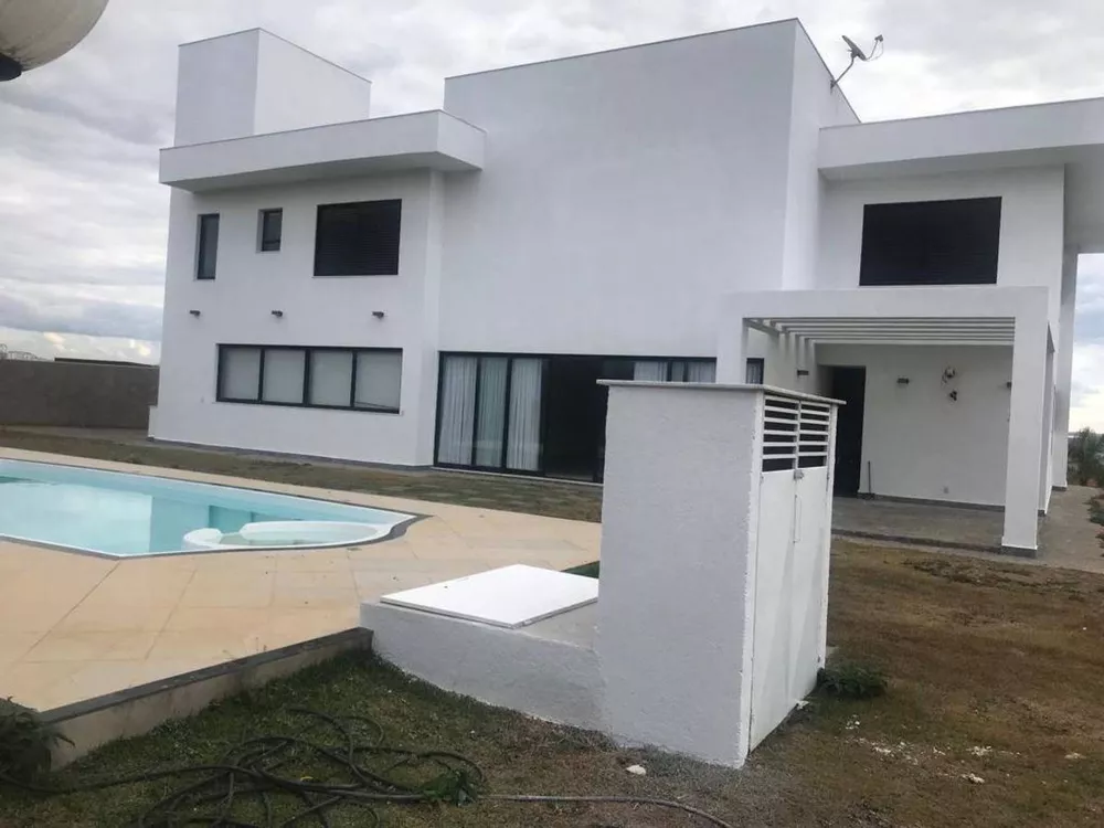 Casa de Condomínio para alugar com 4 quartos, 400m² - Foto 1