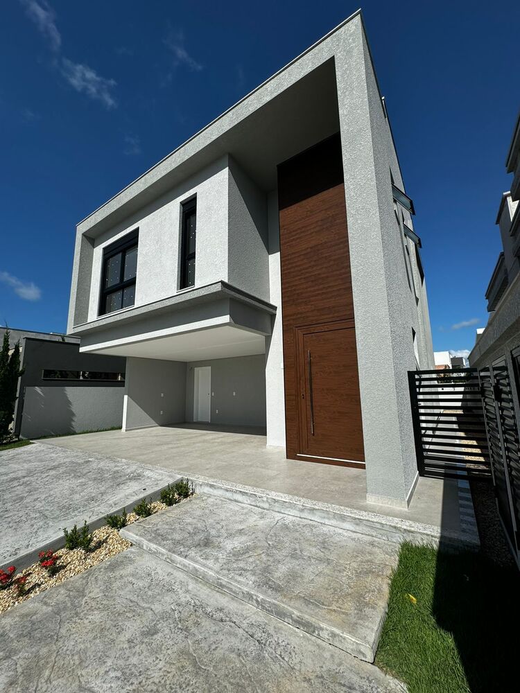 Casa à venda com 3 quartos, 251m² - Foto 1
