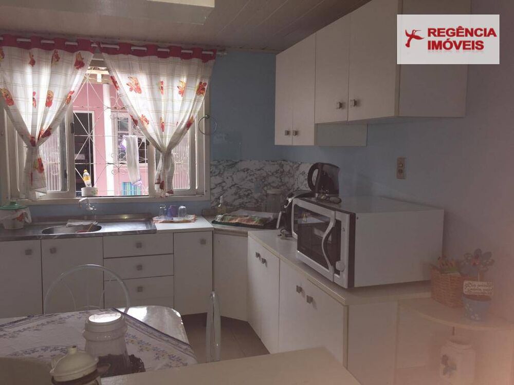 Casa à venda com 4 quartos, 150m² - Foto 2