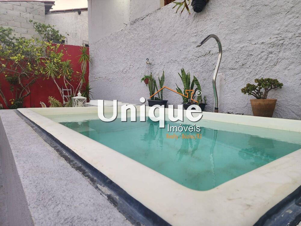 Casa à venda com 5 quartos, 100m² - Foto 1