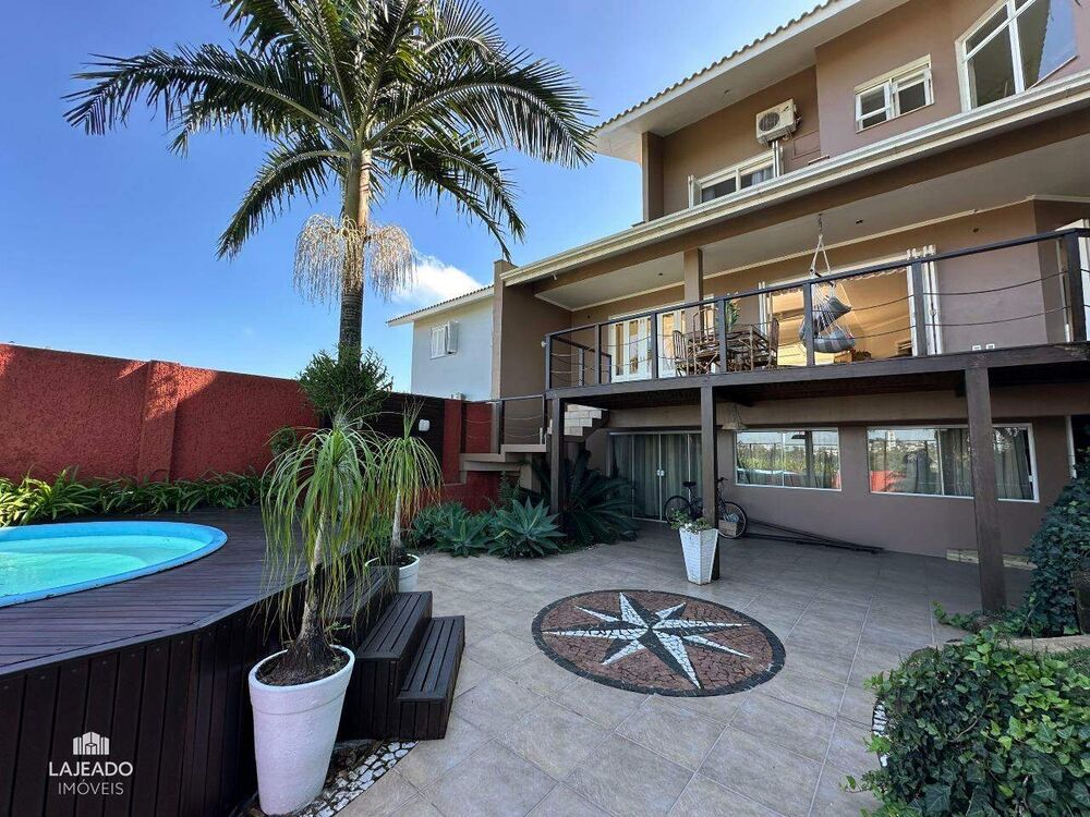 Casa à venda com 4 quartos, 353m² - Foto 1