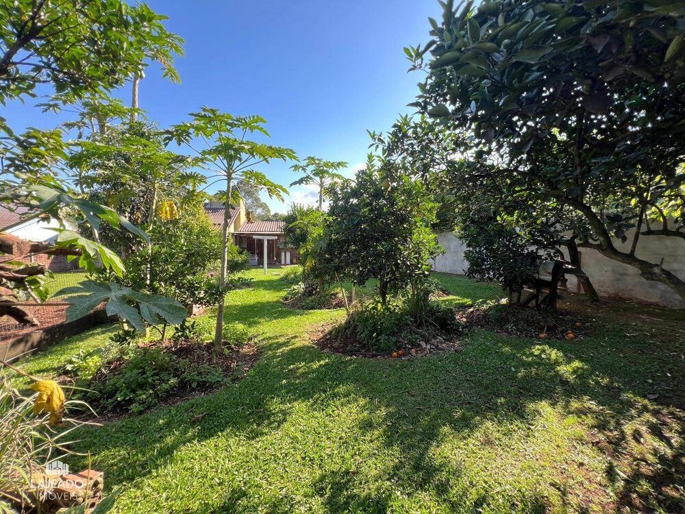 Casa à venda com 3 quartos, 100m² - Foto 1