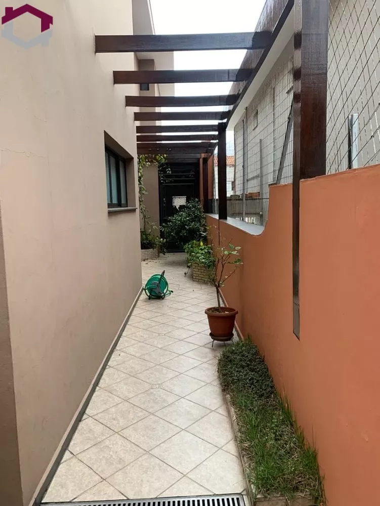 Casa à venda com 4 quartos, 298m² - Foto 7