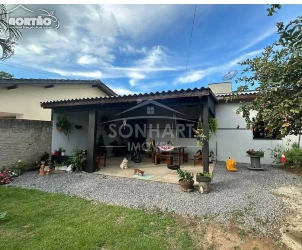 Casa à venda com 3 quartos, 100m² - Foto 1