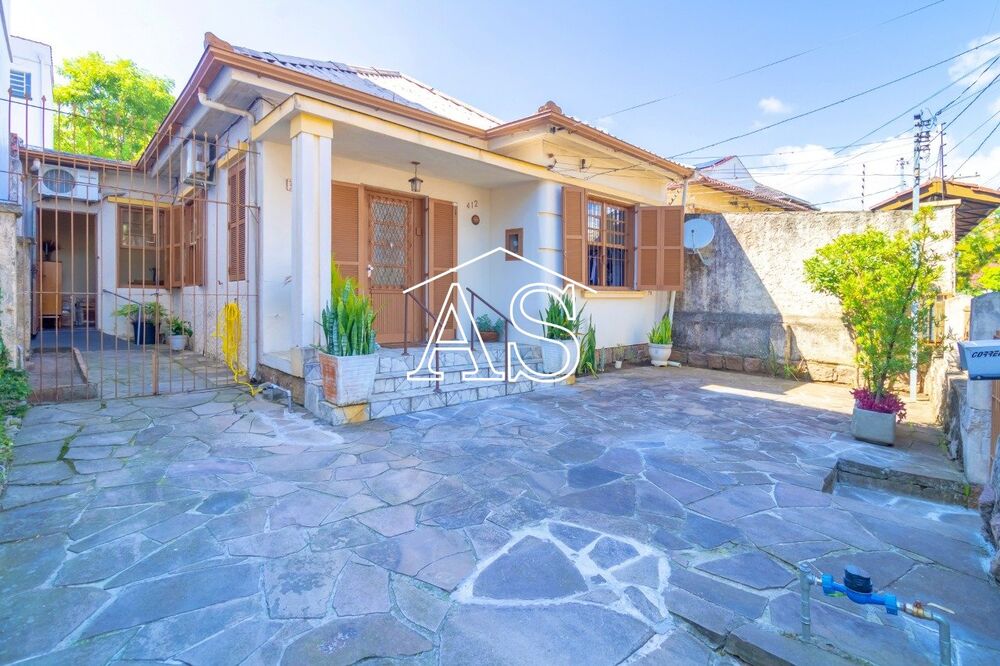 Casa à venda com 3 quartos, 116m² - Foto 1