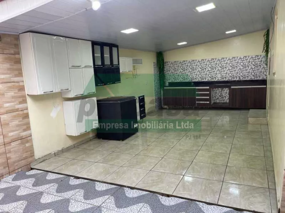 Casa à venda com 3 quartos, 124m² - Foto 1