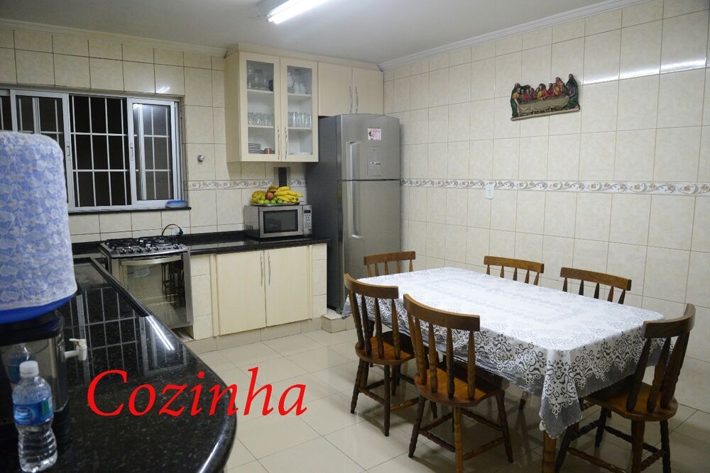 Sobrado à venda com 4 quartos, 303m² - Foto 1