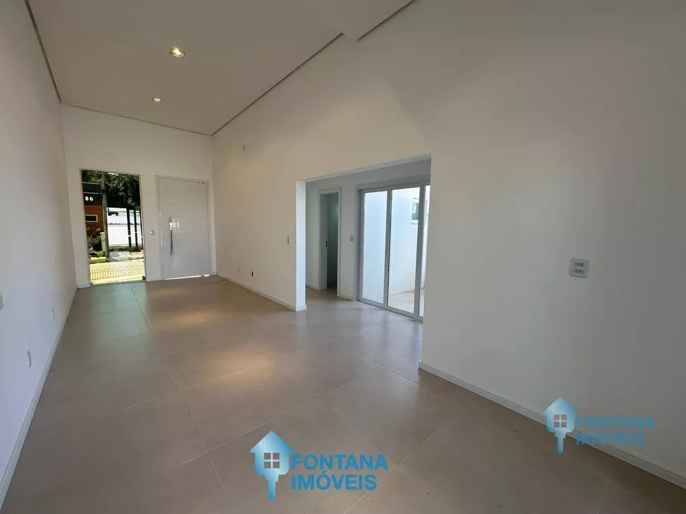 Casa à venda com 3 quartos, 100m² - Foto 2