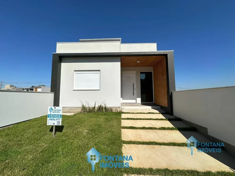 Casa à venda com 3 quartos, 100m² - Foto 1