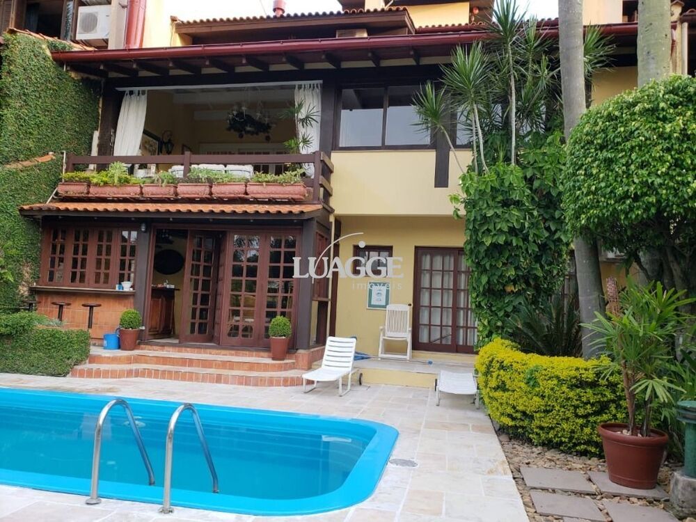 Casa de Condomínio à venda com 5 quartos, 452m² - Foto 1