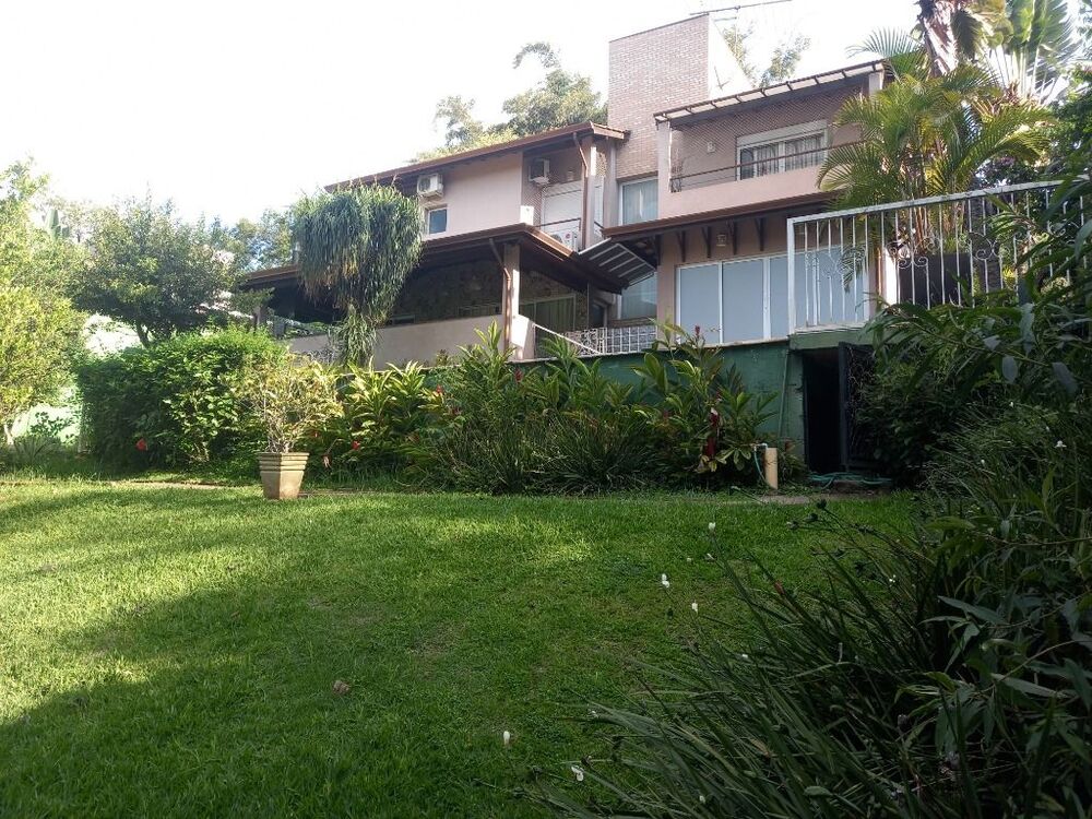 Casa de Condomínio à venda e aluguel com 4 quartos, 368m² - Foto 1