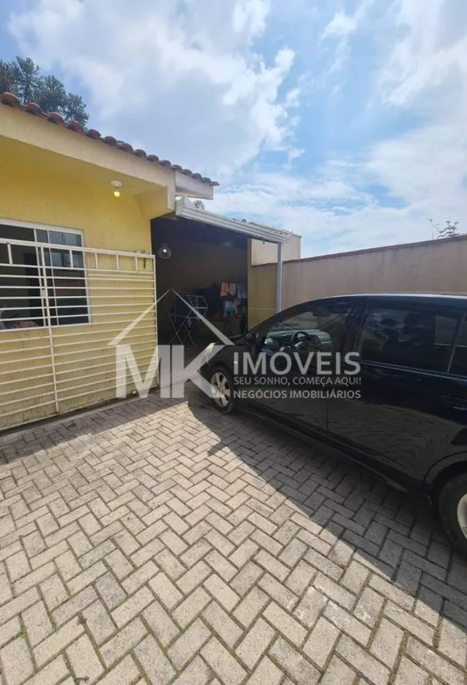 Casa à venda com 3 quartos, 100m² - Foto 1