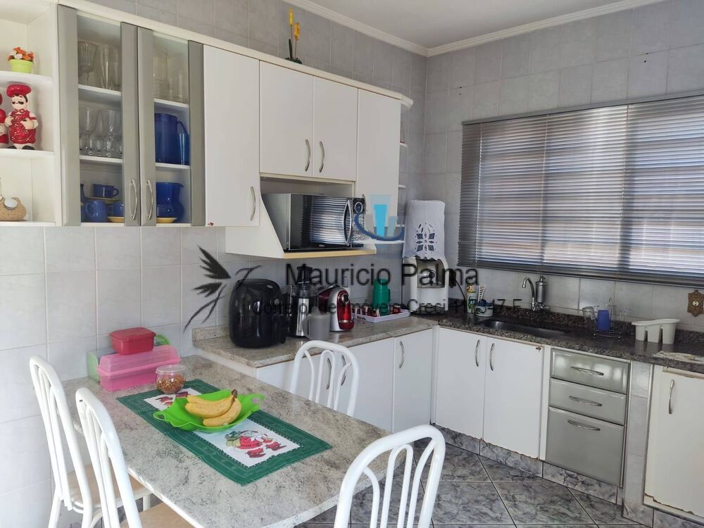 Casa à venda com 3 quartos, 214m² - Foto 5