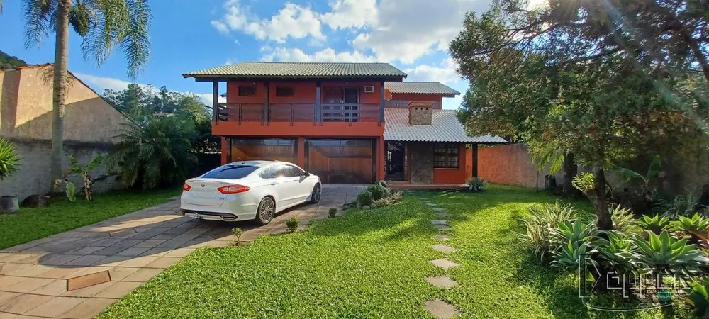 Casa à venda com 4 quartos, 411m² - Foto 1