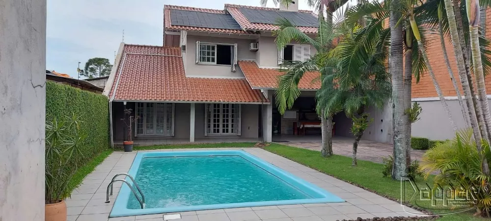 Casa à venda com 3 quartos, 249m² - Foto 1