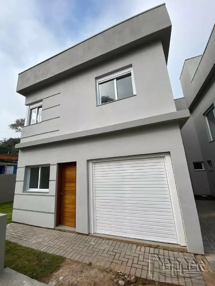 Casa à venda com 3 quartos, 99m² - Foto 1